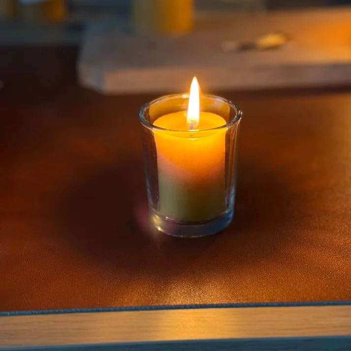 Standard size 4.5cm tall natural beeswax votive candle designed to fit seamlessly into standard glass holders.
