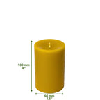 Eco-friendly homeware retail display featuring 100% natural, hand-poured beeswax pillar candles in branded bands.