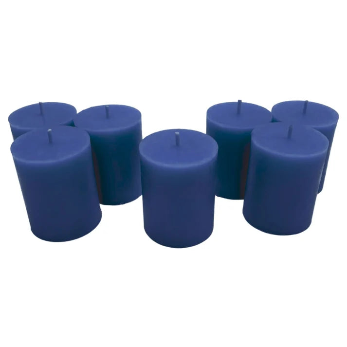 Pure British beeswax votive burning cleanly inside a snug-fitting glass container for an 18-hour burn time.