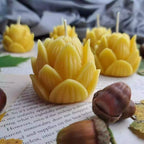 Hand-poured pure beeswax lotus shaped candles manufactured in our Leicester workshop for UK wholesale.
