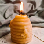 Hand-poured pure beeswax beehive shaped candles manufactured in our Leicester workshop for UK wholesale.