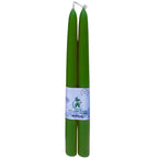 Pure, non-toxic beeswax taper candles that purify the air while burning cleanly in a cosy living room.
