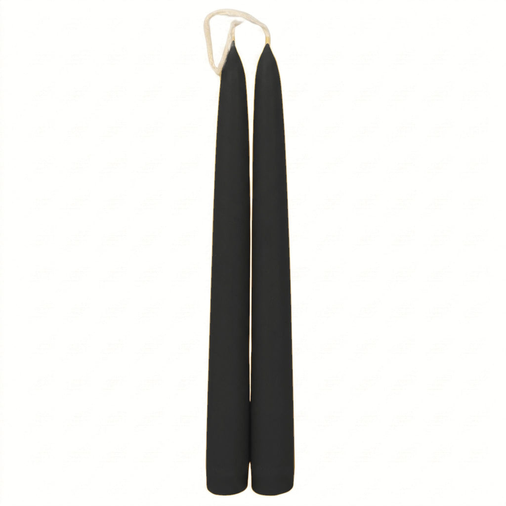 A set of smooth taper candles showcasing the rich, natural black colour of unrefined beeswax.