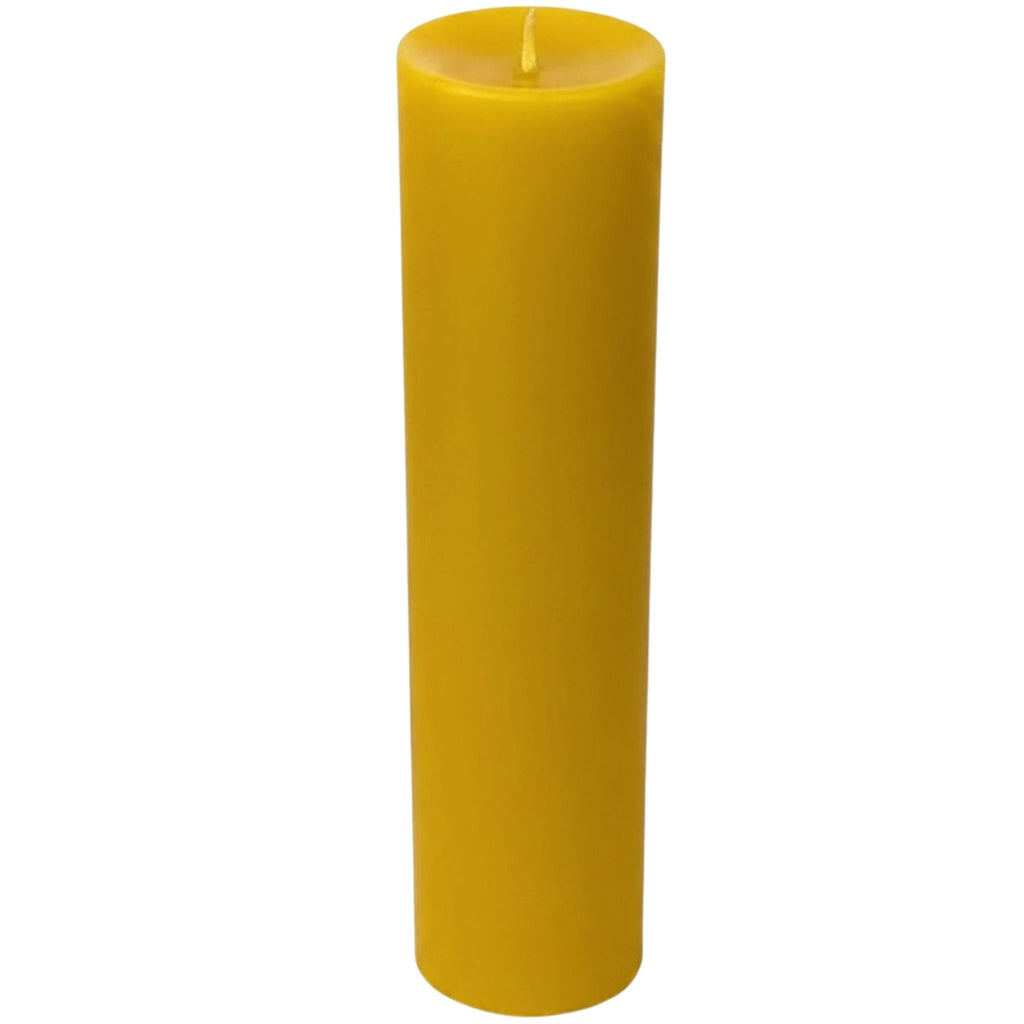 Zero-waste shop inventory showing naked natural beeswax pillar candles merchandised completely plastic-free.