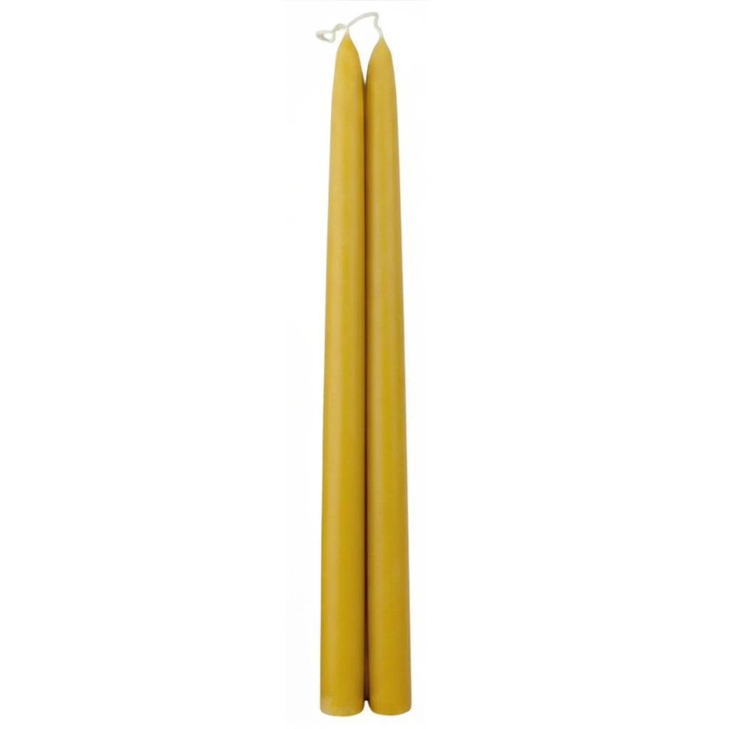 Unlabelled tall natural beeswax banquet candles displayed without packaging for B2B retail stockists.